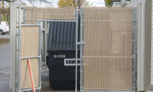 chainlink-dumpster-enclosure-with-slats-and-man-gate